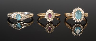 Lot 318 - Three various 9ct gold gem set cluster rings,...