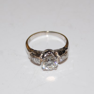 Lot 322 - A white metal art deco style diamond set...