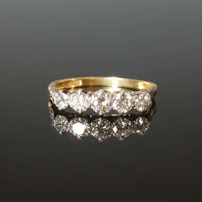 Lot 325 - A mid-20th century yellow and white metal five...