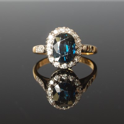 Lot 329 - A yellow and white metal sapphire and diamond...
