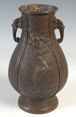 Lot 511 - A Chinese bronze twin handled archaic style...