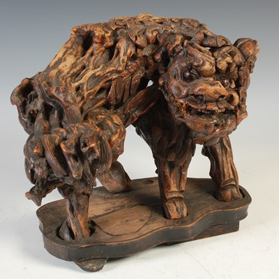 Lot 519 - An antique Chinese root wood carving of a...