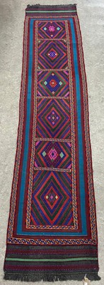 Lot 924 - An old Suzni runner, the rectangular field...