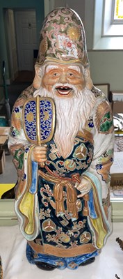 Lot 503 - A large Japanese porcelain figure of Jurojin,...