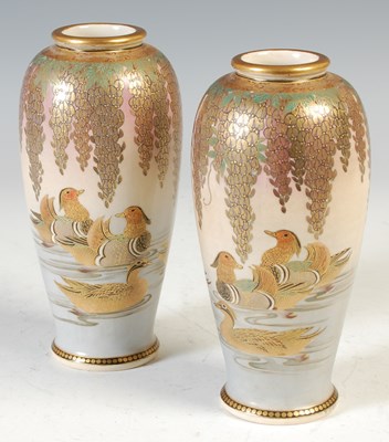 Lot 495 - A pair of Japanese Satsuma pottery vases,...