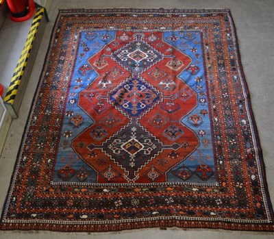 Lot 933 - A Persian Shiraz carpet, the rectangular field...