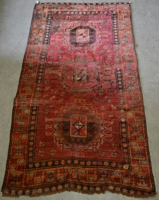 Lot 936 - A Persian rug, the rectangular field centred...