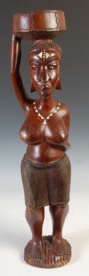 Lot 384 - A 20th century hardwood sculpture of an...