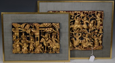 Lot 642 - A pair of Chinese carved and pierced giltwood...