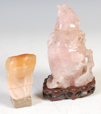 Lot 392 - A Chinese rose quartz urn and cover, carved...