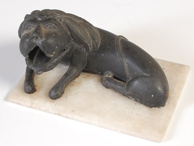 Lot 395 - A grand tour souvenir carved with a lion,...