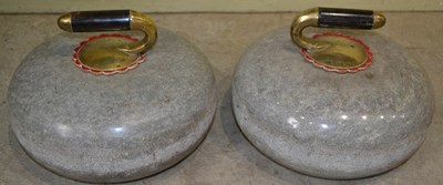 Lot 870A - A pair of granite curling stones with brass...