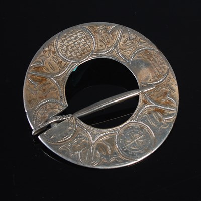Lot 147 - An 18th century Scottish white metal plaid...