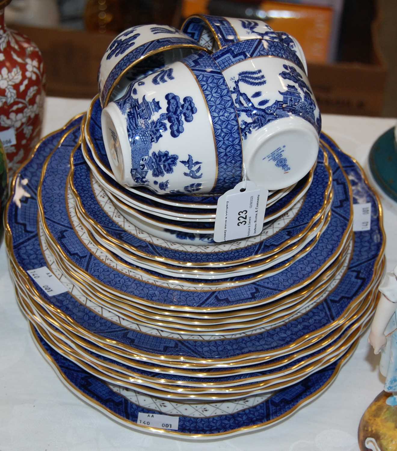 Lot 323 - A Royal Doulton Booths Real Old Willow pattern...