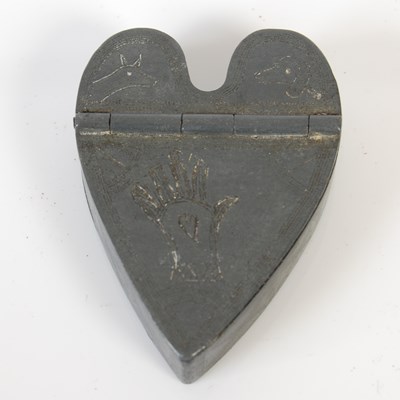 Lot 247 - An unusual heart-shaped pewter snuff box, the...