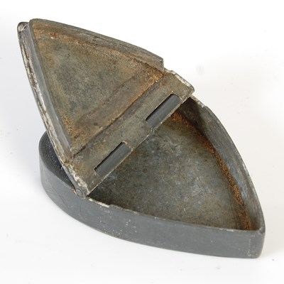 Lot 247 - An unusual heart-shaped pewter snuff box, the...