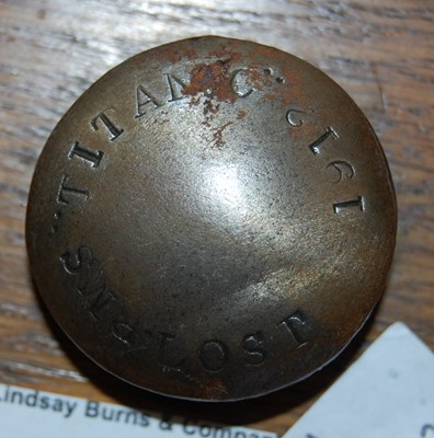 Lot 205 - Titanic interest: a metal souvenir/ rivet?...