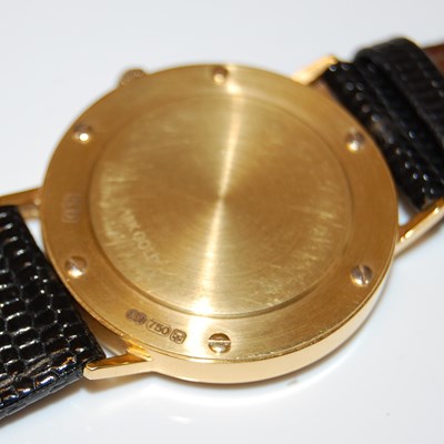 Lot 232 - An 18ct gold gents Rotary Elite wristwatch,...