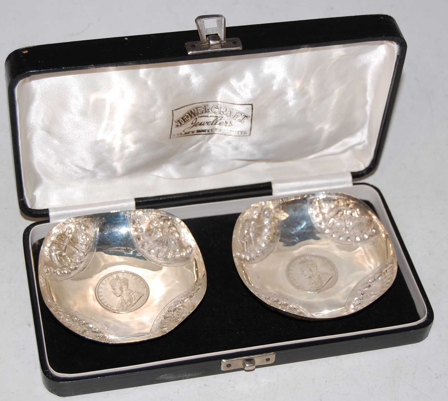 Lot 255 - A cased pair of Indian silver coin-set bowls,...