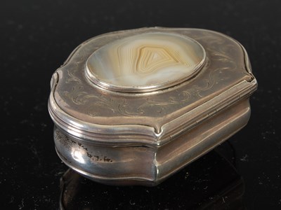 Lot 258 - A silver cartouche-shaped snuff box, the...