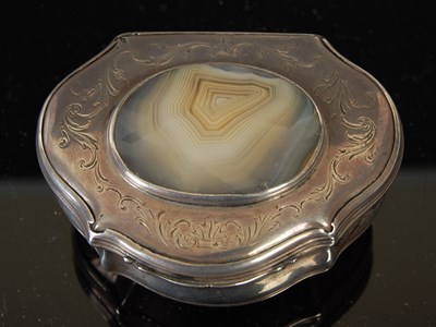Lot 258 - A silver cartouche-shaped snuff box, the...