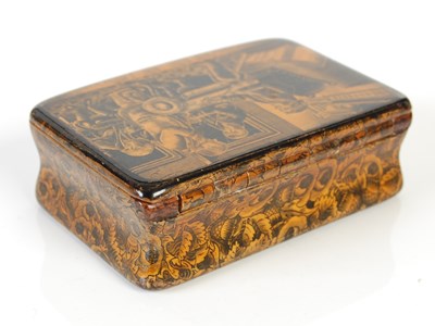 Lot 263 - A Mauchline ware penwork oblong snuff box, the...