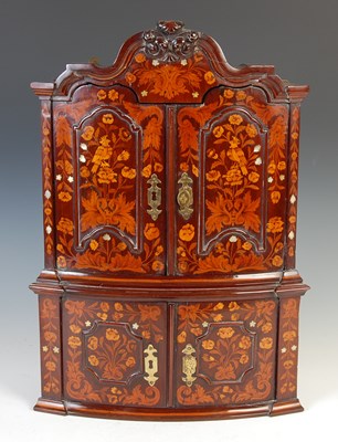 Lot 155 - An 18th century Dutch miniature mahogany and marquetry hanging corner cabinet