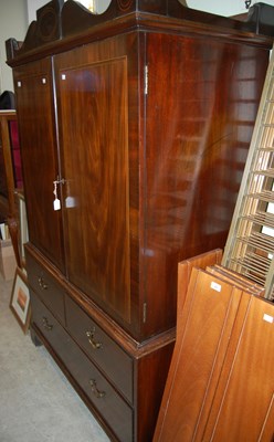 Lot 606 - A 19th century mahogany linen press, the upper...