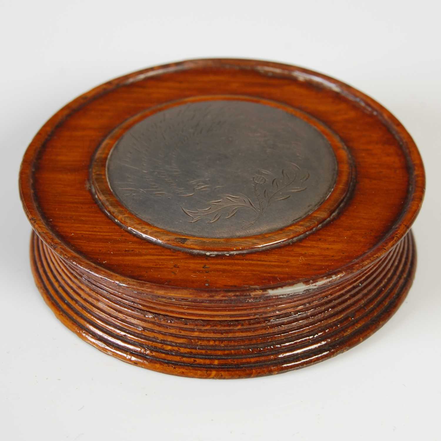 Lot 275 - A Mauchline ware circular penwork snuff box,...