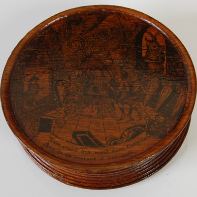 Lot 275 - A Mauchline ware circular penwork snuff box,...