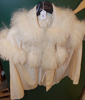 Lot 530 - A vintage ladies cape in off-white with...