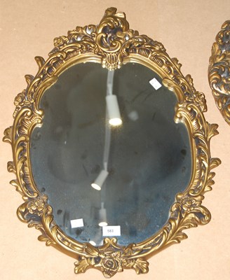 Lot 583 - A composite gilt framed Rococo style oval wall...