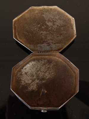 Lot 282 - A steel octagonal snuff box, the hinged cover...
