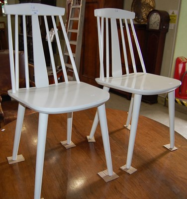 Lot 745 - A pair of white painted spindle back kitchen...