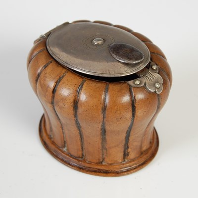 Lot 283 - A treen baluster snuff mull with fluted sides,...