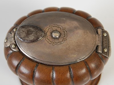 Lot 283 - A treen baluster snuff mull with fluted sides,...