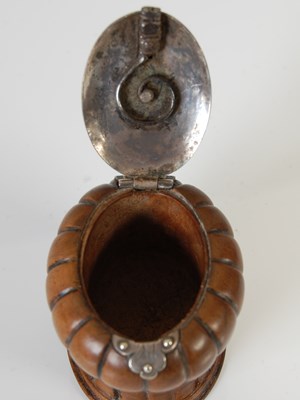 Lot 283 - A treen baluster snuff mull with fluted sides,...