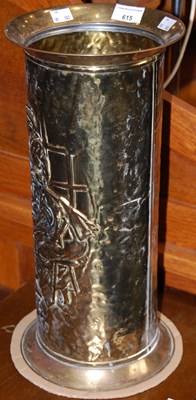 Lot 615 - A brass embossed stick stand depicting musicians