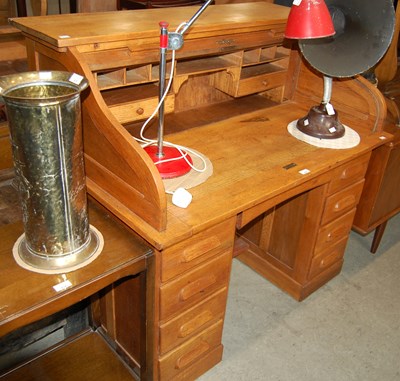 Lot 616 - An oak roll-top desk