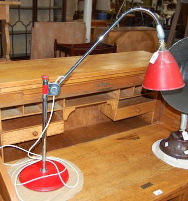 Lot 617 - A chrome and red industrial style table lamp