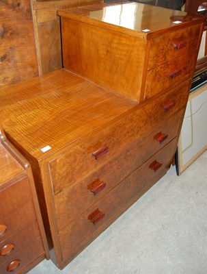 Lot 623 - An Art Deco walnut shaped chest of drawers...