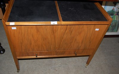 Lot 769 - A good quality mid century walnut work table,...
