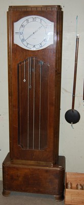 Lot 774 - An Art Deco walnut longcase clock, Gomersall's...