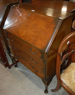 Lot 628 - A 20th century walnut bureau, together with a...