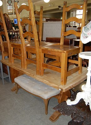 Lot 778 - A pine rectangular refectory table, four...