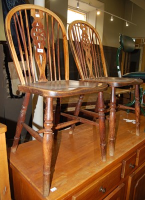 Lot 780 - A pair of spindle and wheel back beech and ash...