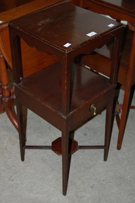 Lot 674 - A 20th century dark wood bedside table with...