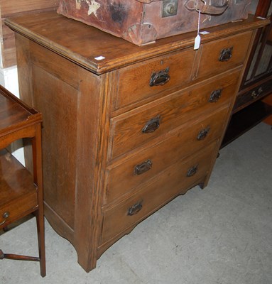 Lot 676 - An oak Arts and Crafts chest of two short over...
