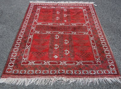 Lot 812 - A Persian rug, the rectangular field with two...