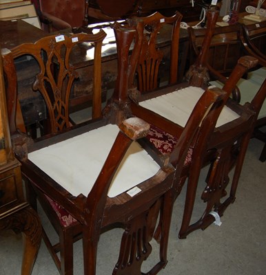 Lot 688 - A set of four George III mahogany dining...